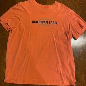 American Eagle t-shirt with retro graphics. Crew neck in salmon. Large.